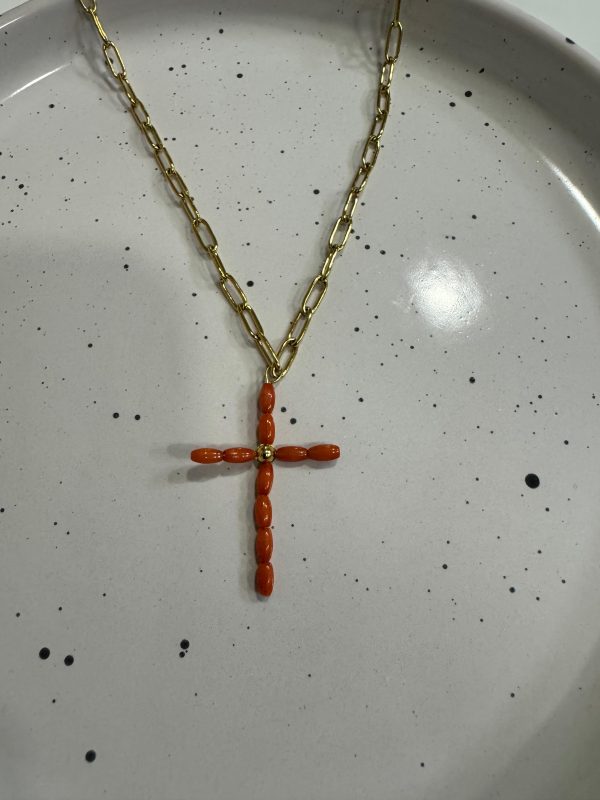 Cruz piedra coral